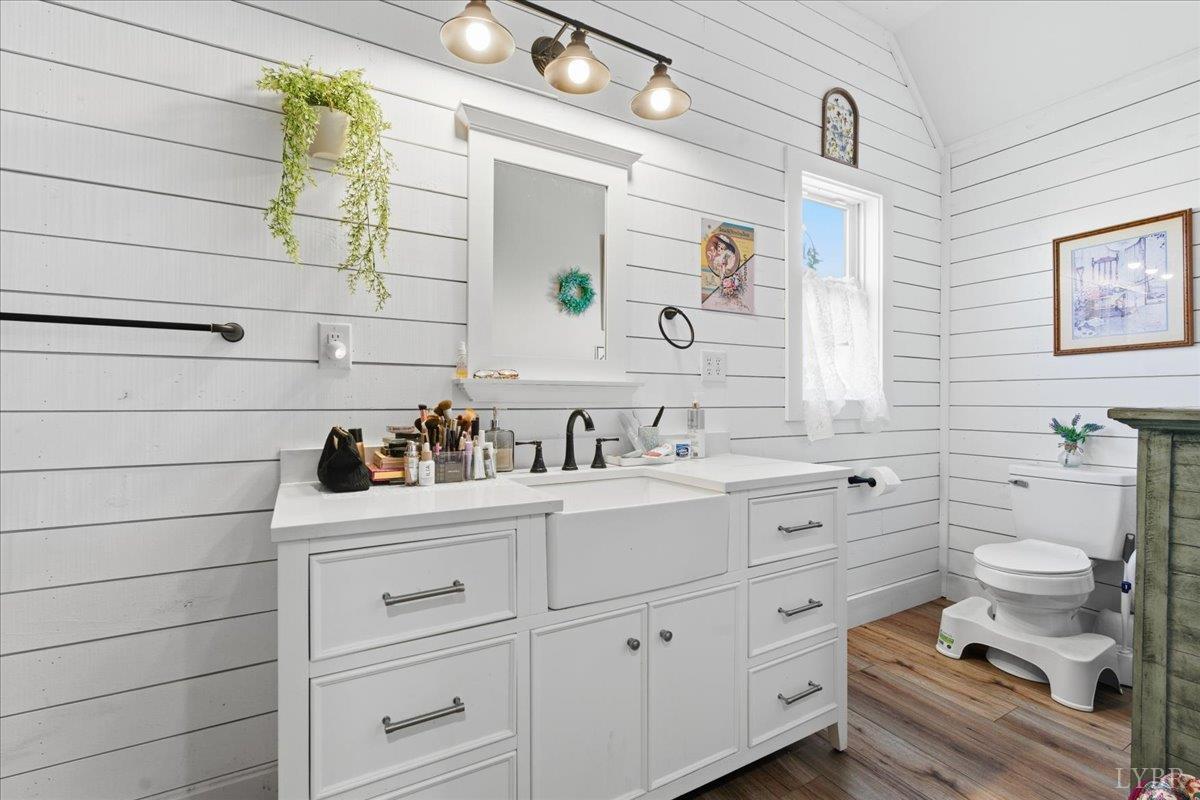 1618 Quaker Church Road Bedford, VA 24523 - Photo 25 of 50 a bathroom with a toilet sink and mirror