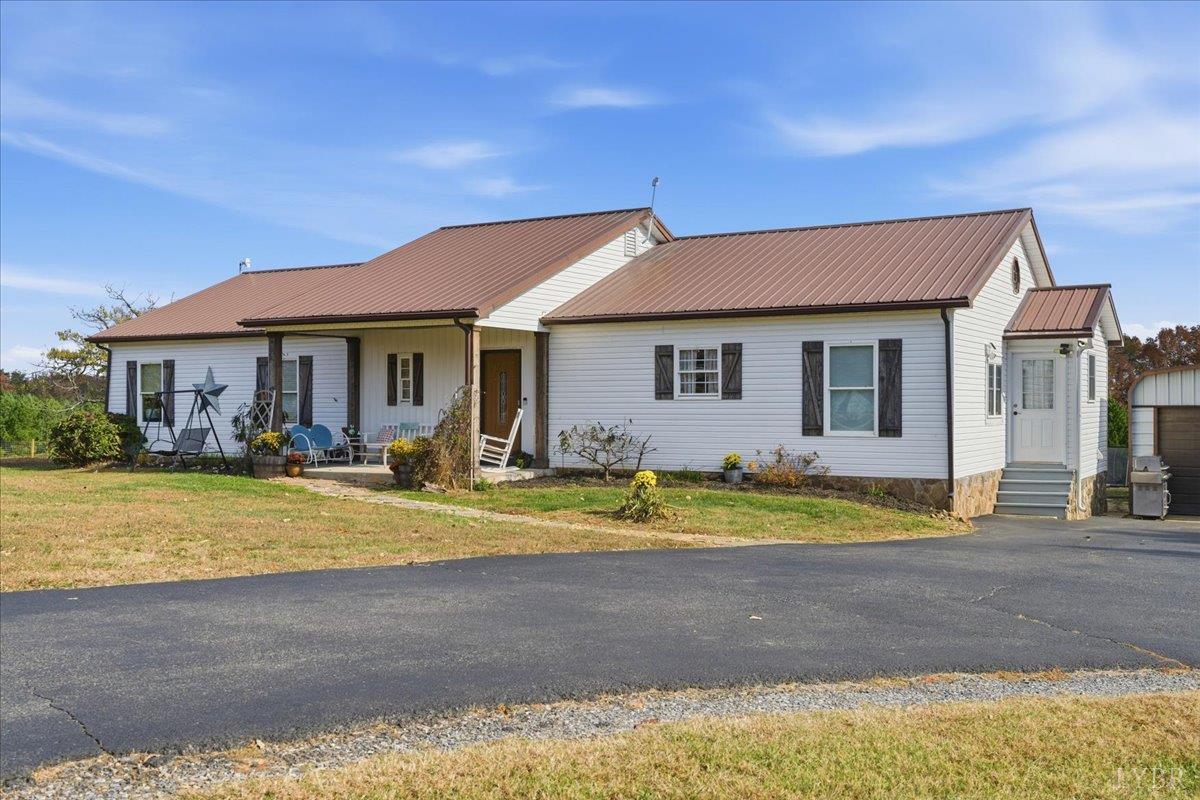 1618 Quaker Church Road Bedford, VA 24523 - Photo 3 of 50 a view of a house with swimming pool and a yard