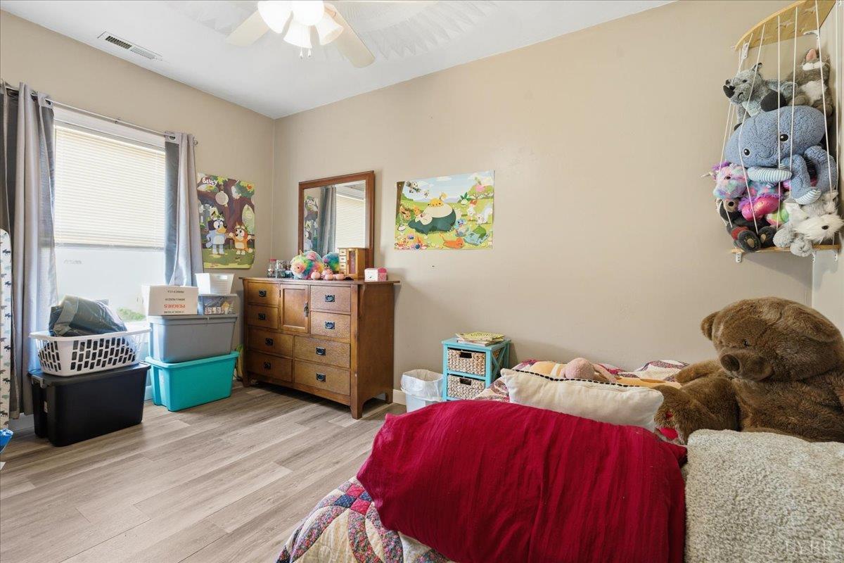 1618 Quaker Church Road Bedford, VA 24523 - Photo 33 of 50 a bedroom with a bed and a window