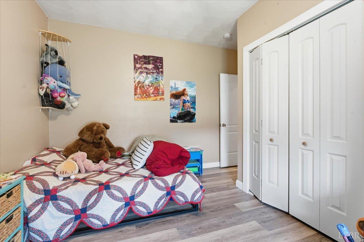 1618 Quaker Church Road Bedford, VA 24523 - Photo 34 of 50 a bedroom with a bed and a window