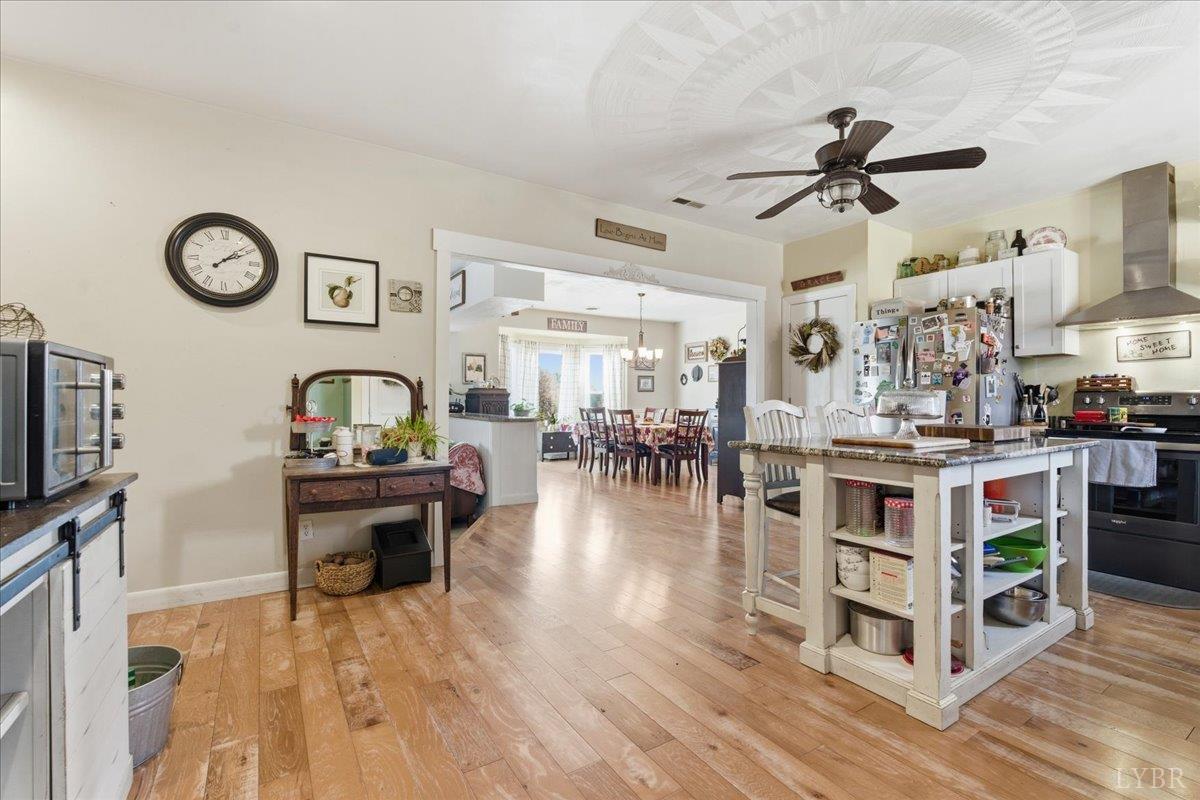 1618 Quaker Church Road Bedford, VA 24523 - Photo 7 of 50 a living room with furniture and a flat screen tv