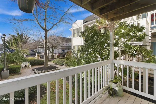 a view of a balcony with plants