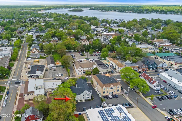 an aerial view of a city with lots of residential buildings