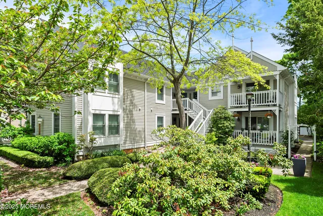 front view of a house with a garden