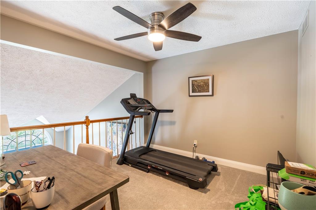228 Country View Drive Lower Burrell, PA 15068 - Photo 21 of 49 a living room with furniture and a table