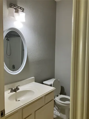a bathroom with a sink and a toilet