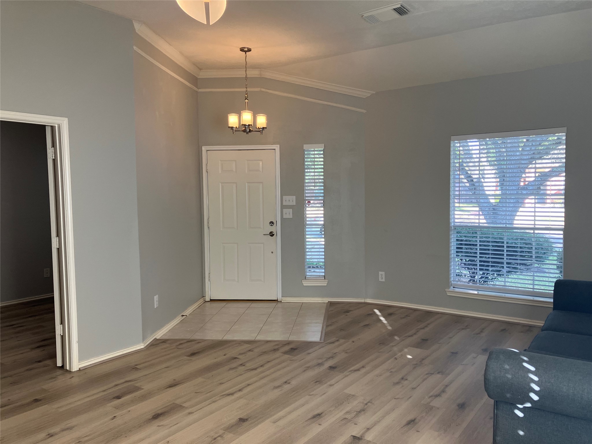 3402 Pebble Beach Lane Pearland, TX 77584 - Photo 30 of 31 an empty room with wooden floor and windows