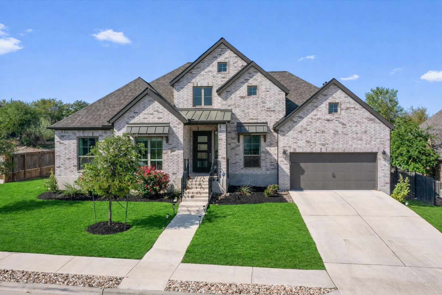 101 Pienza Drive Georgetown, TX 78628 - Photo 1 of 40 a front view of a house with a yard
