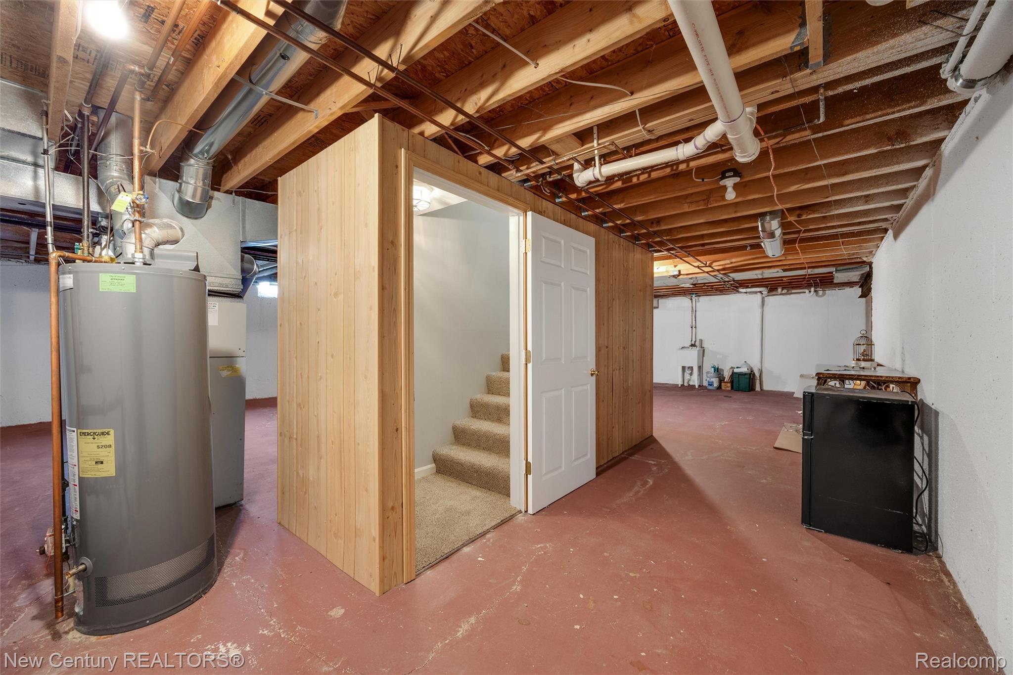26013 Ranger Avenue Warren, MI 48091 - Photo 19 of 25 Unfinished below grade area with stairs and water heater