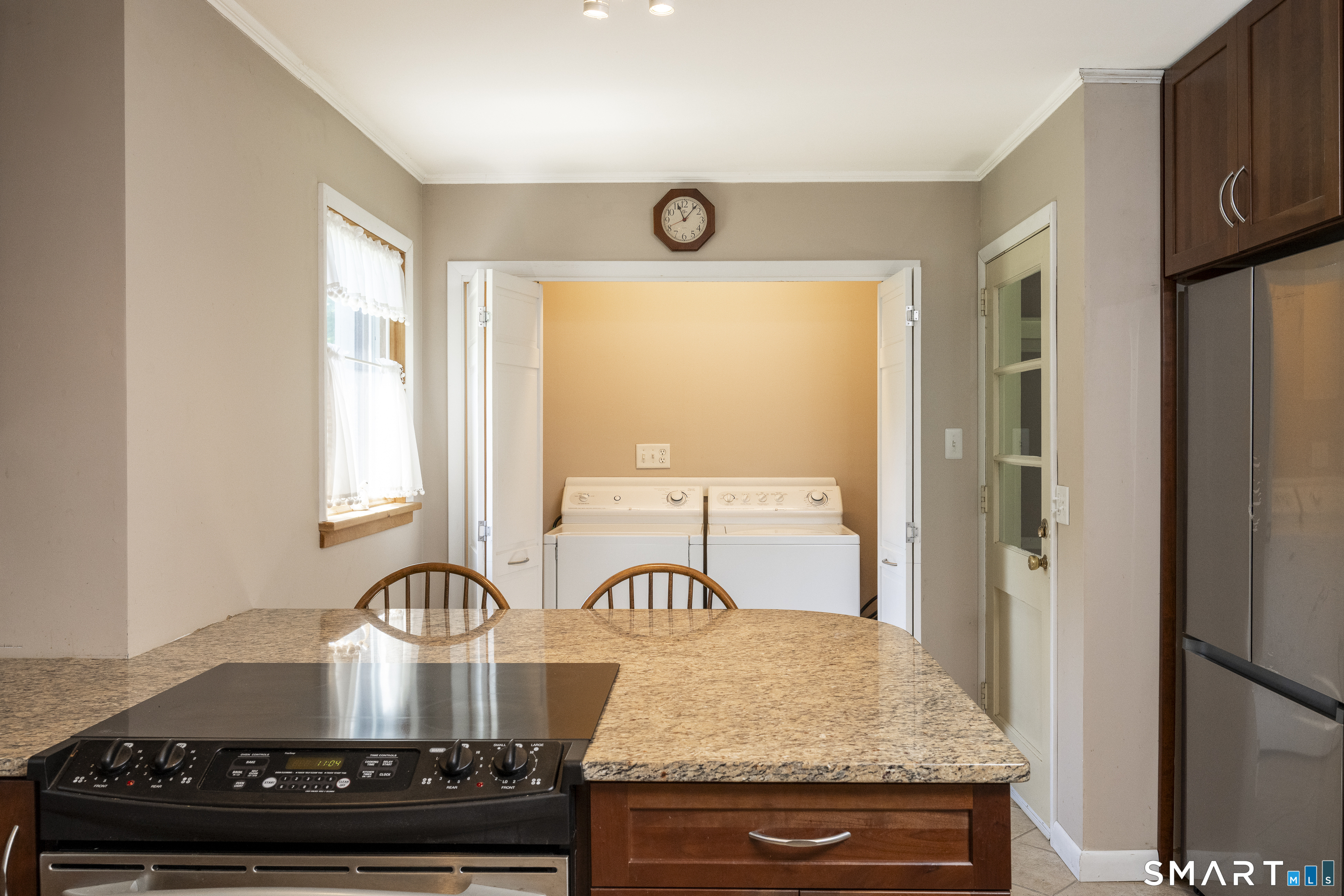 39 Indian Mountain Road Salisbury, CT 06039 - Photo 5 of 16 a kitchen with a stove and a refrigerator