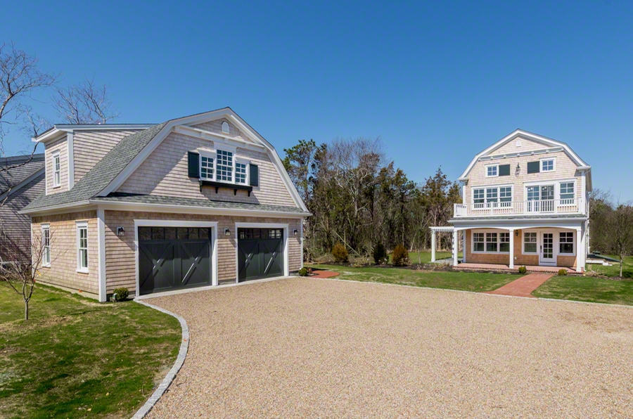 57 Clevelandtown Road Edgartown, MA 02539 - Photo 1 of 34 a front view of a house with a yard