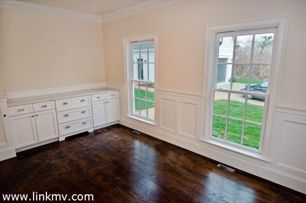 57 Clevelandtown Road Edgartown, MA 02539 - Photo 14 of 34 a view of an empty room with wooden floor and a window