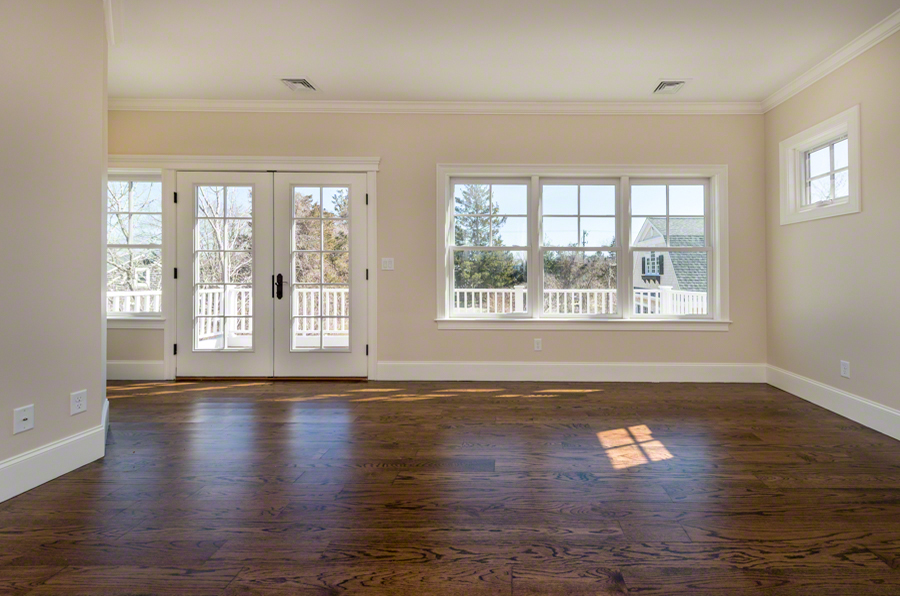 57 Clevelandtown Road Edgartown, MA 02539 - Photo 17 of 34 a view of an empty room with wooden floor and a window