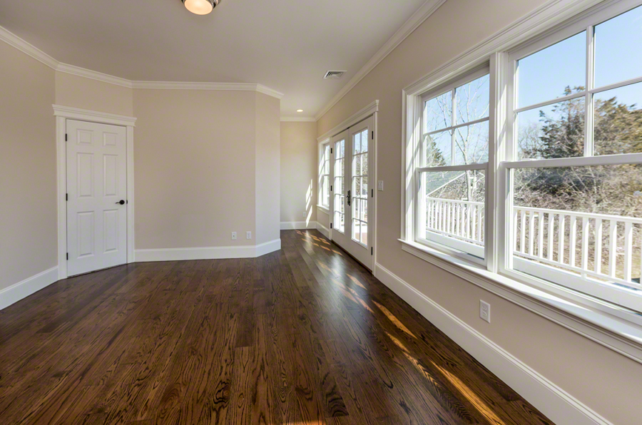 57 Clevelandtown Road Edgartown, MA 02539 - Photo 18 of 34 wooden floor in an empty room with a window