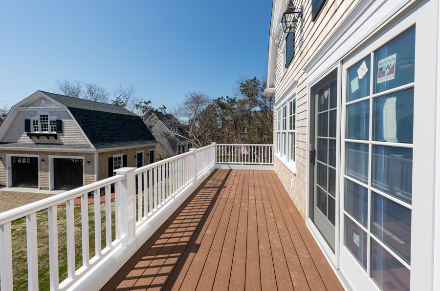 57 Clevelandtown Road Edgartown, MA 02539 - Photo 19 of 34 a view of balcony with wooden floor and fence