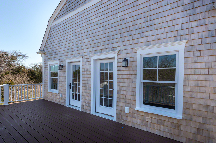 57 Clevelandtown Road Edgartown, MA 02539 - Photo 25 of 34 a front view of a house with glass windows