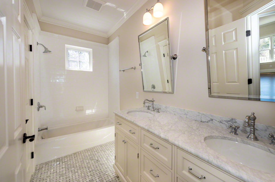 57 Clevelandtown Road Edgartown, MA 02539 - Photo 27 of 34 a bathroom with a sink a mirror and a bathtub