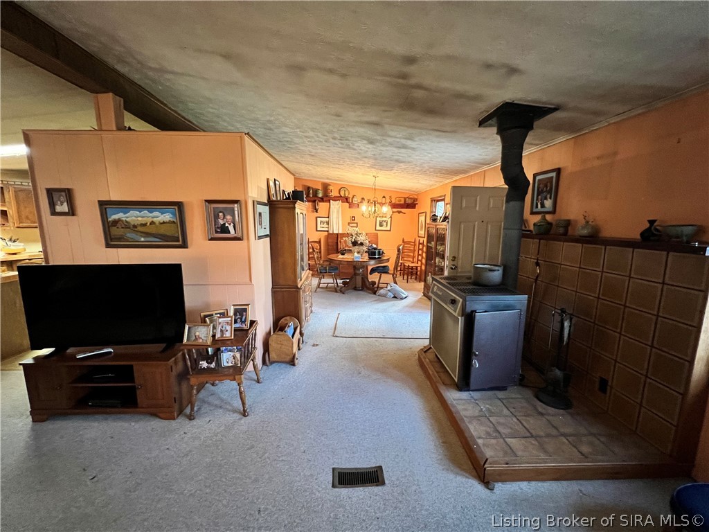 3272 Edwardsville Galena Road Georgetown, IN 47122 - Photo 3 of 25 Wood stove