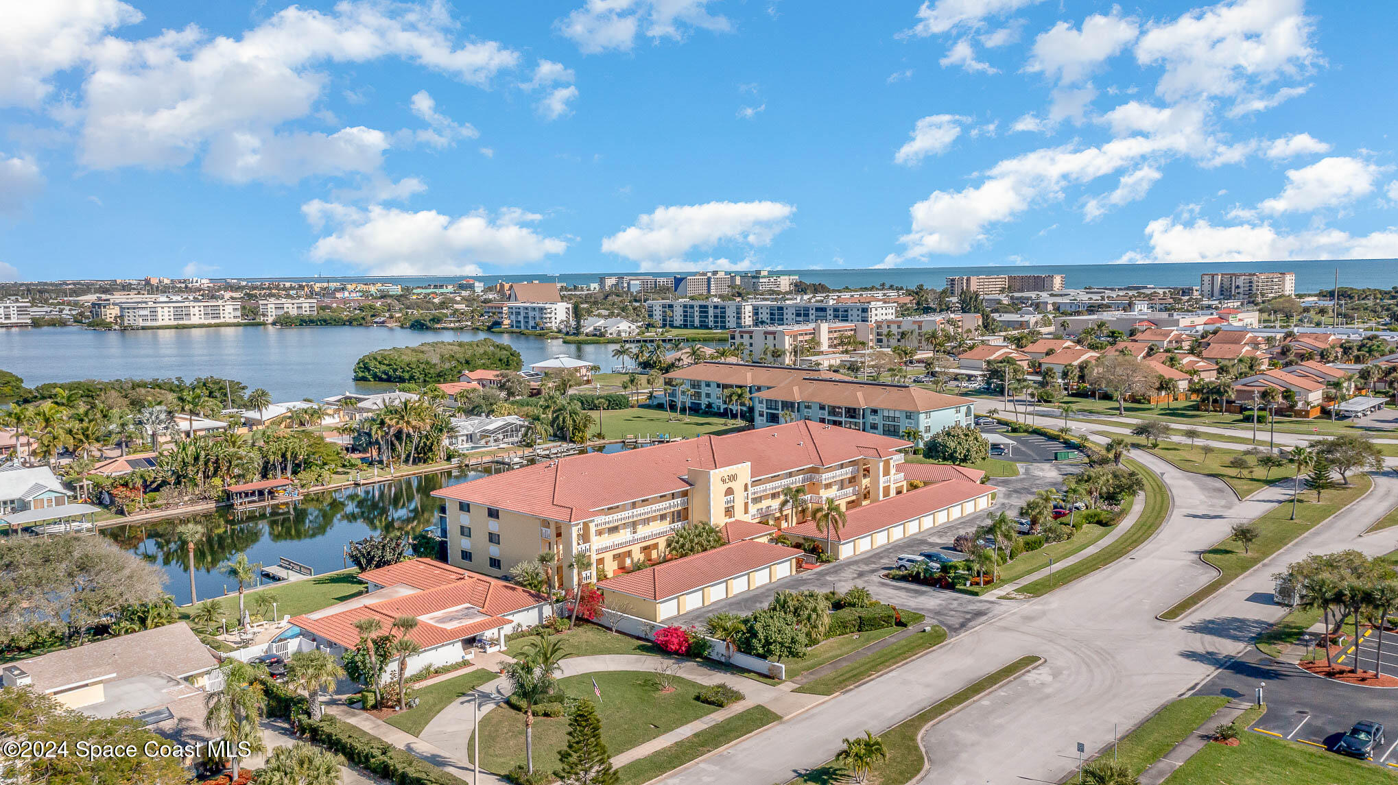 300 South Banana River Boulevard, Unit 305 Cocoa Beach, FL 32931 - Photo 31 of 36 an aerial view of a city