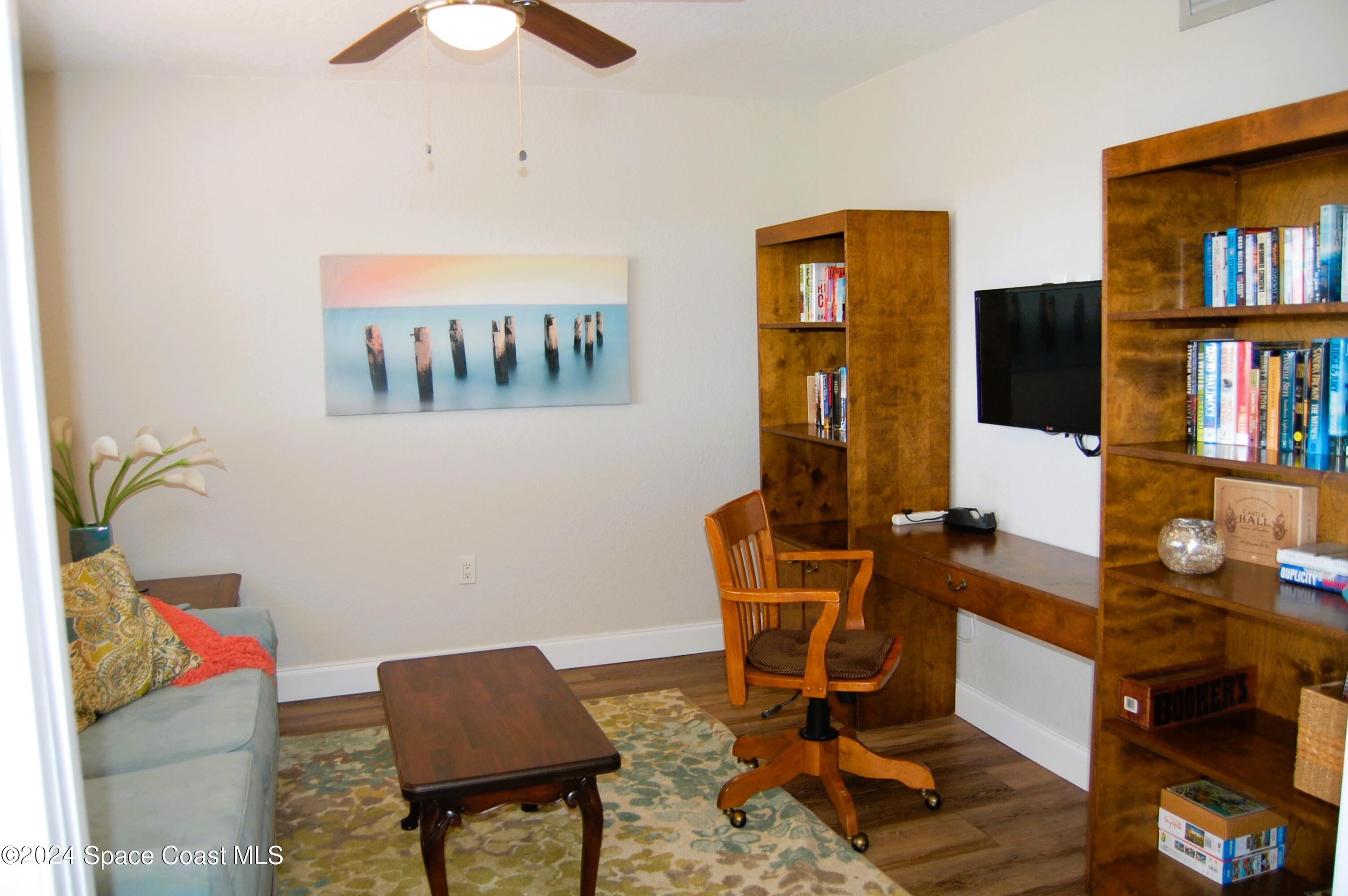300 South Banana River Boulevard, Unit 305 Cocoa Beach, FL 32931 - Photo 10 of 36 a view of a workspace with furniture