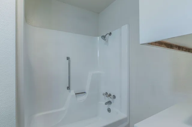 a bathroom with a bathtub
