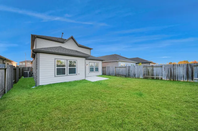 a view of a backyard with a garden