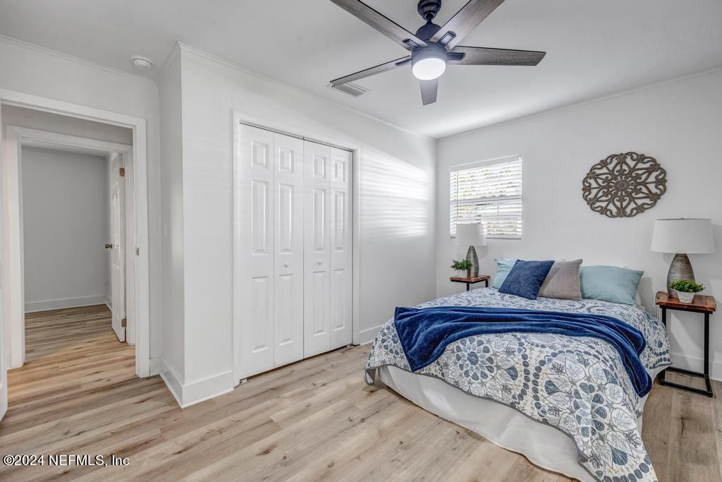 903 Royal Road St. Augustine, FL 32086 - Photo 21 of 32 a bedroom with a bed and a window