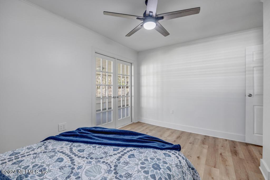 903 Royal Road St. Augustine, FL 32086 - Photo 22 of 32 a bedroom with a bed and a window