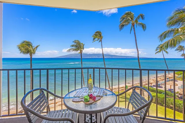 a view of a balcony and chairs