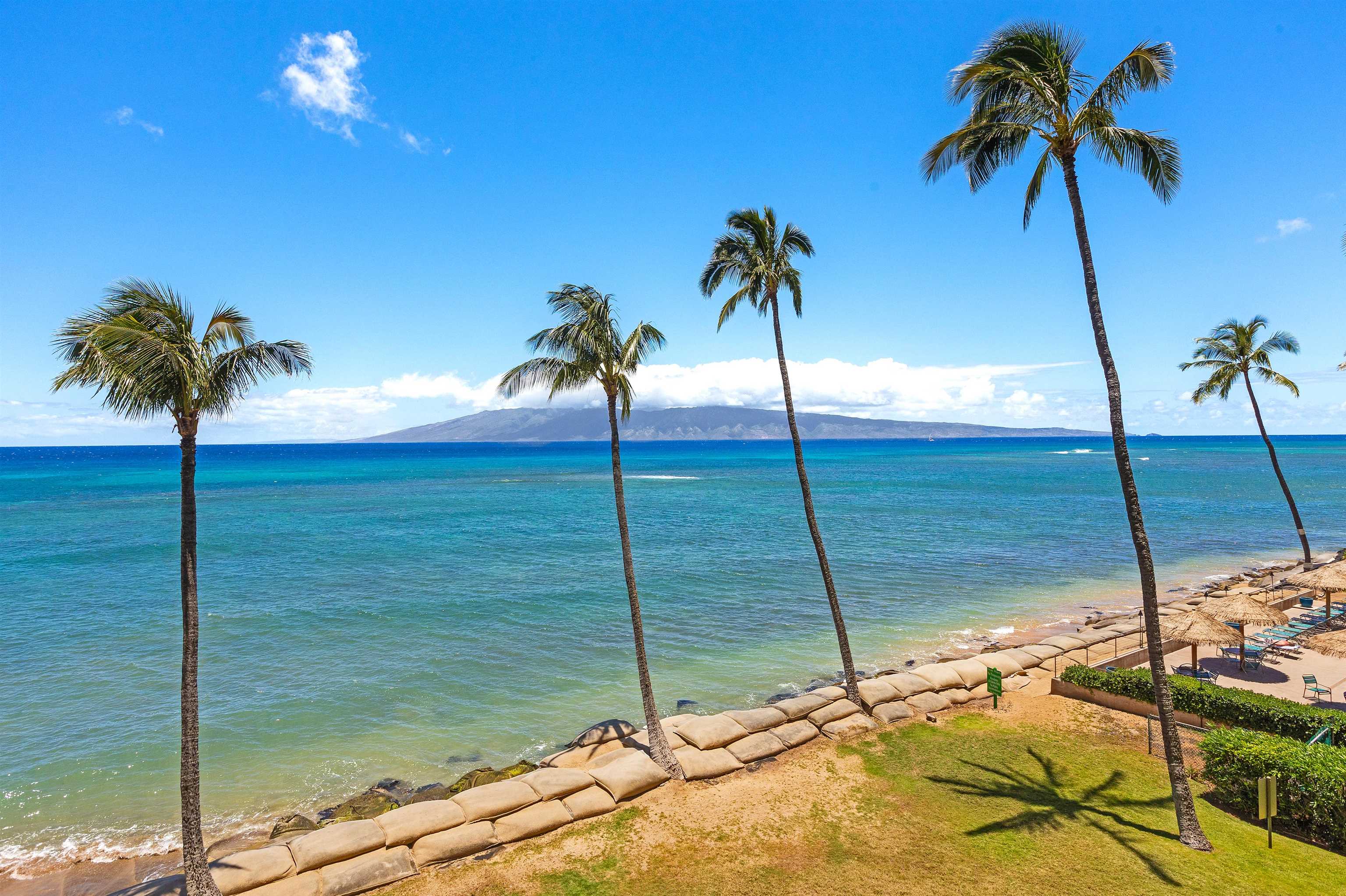 4327 Lower Honoapiilani Road, Unit 406B Lahaina, HI 96761 - Photo 16 of 26 a house with a ocean view