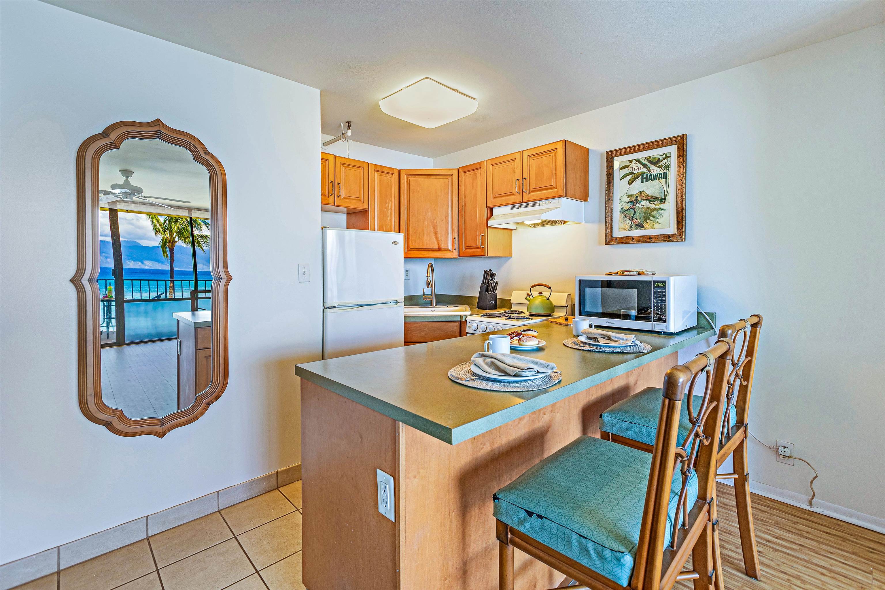 4327 Lower Honoapiilani Road, Unit 406B Lahaina, HI 96761 - Photo 8 of 26 a workspace with furniture and window