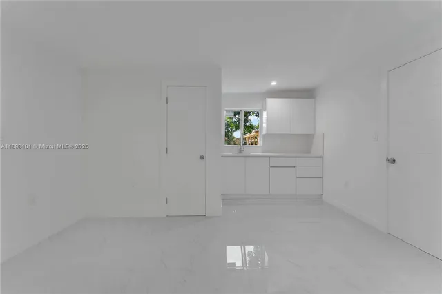 a view of cabinets and window