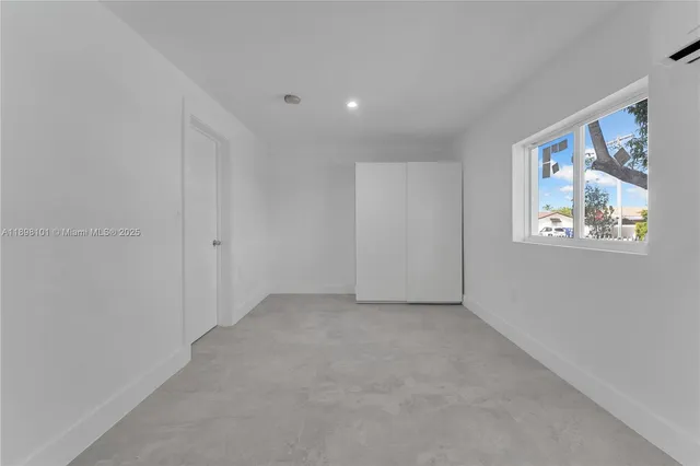 an empty room with a window