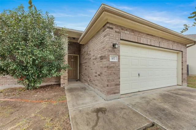 a house with trees in front of it