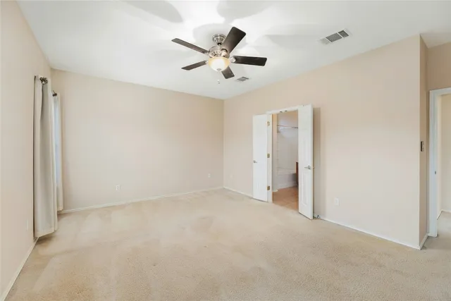 a bathroom with a tub sink double and mirror