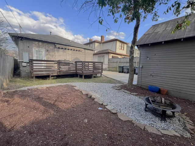 a view of a house with a back yard