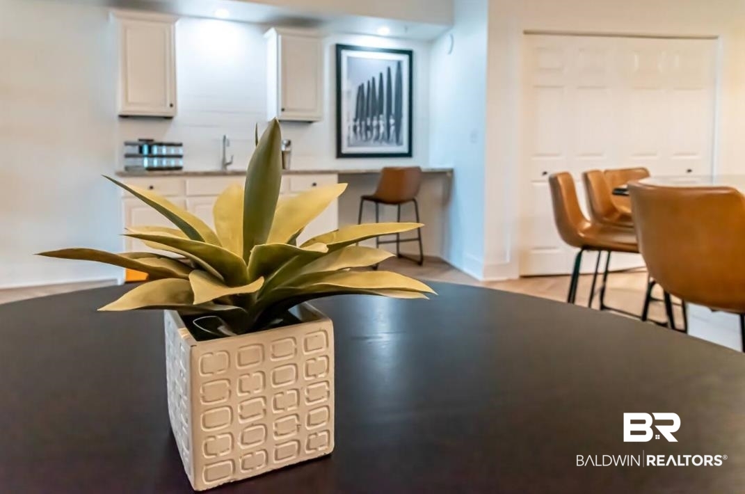 27800 Canal Road, Unit 212 Orange Beach, AL 36561 - Photo 13 of 43 Interior space featuring white cabinetry and a sink