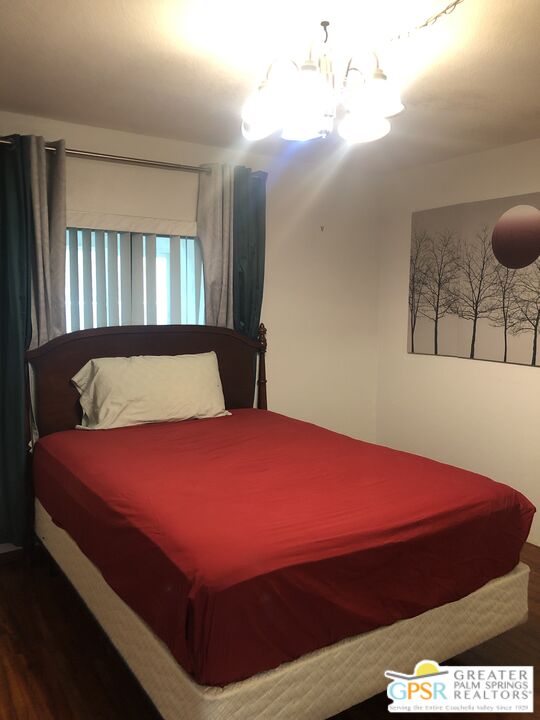 69525 Dillon Road, Unit 73 Desert Hot Springs, CA 92241 - Photo 19 of 48 a bedroom with a bed and window