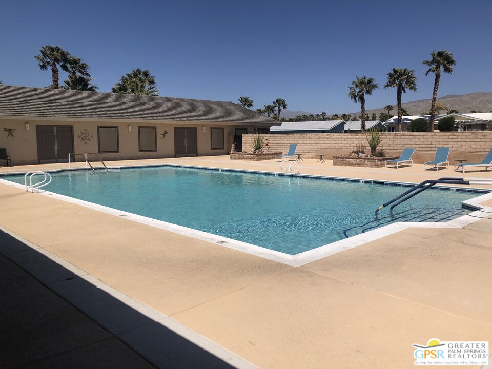 69525 Dillon Road, Unit 73 Desert Hot Springs, CA 92241 - Photo 25 of 48 a view of a house with outdoor space