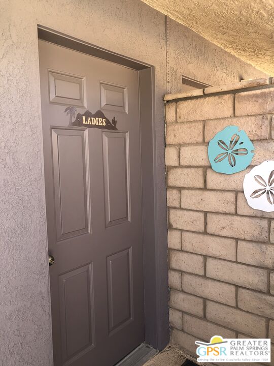 69525 Dillon Road, Unit 73 Desert Hot Springs, CA 92241 - Photo 29 of 48 a bathroom with a shower and a sink