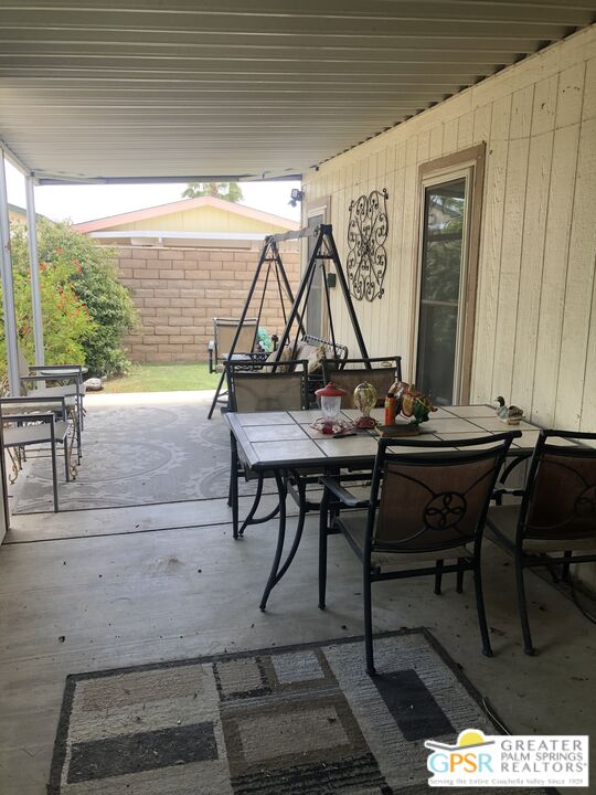 69525 Dillon Road, Unit 73 Desert Hot Springs, CA 92241 - Photo 6 of 48 a view of a dining room with furniture and window