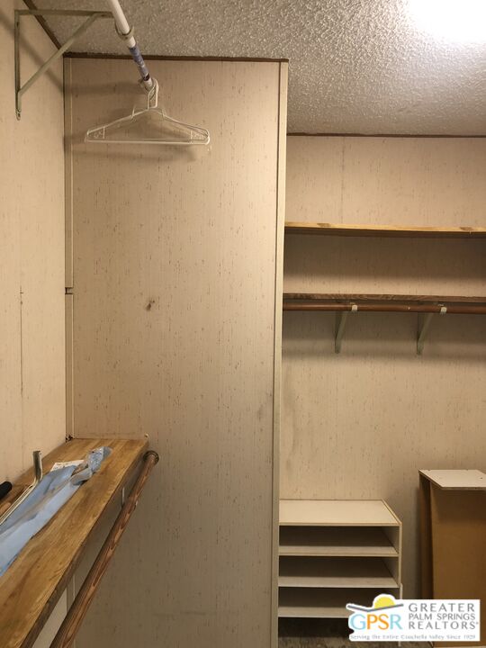 69525 Dillon Road, Unit 73 Desert Hot Springs, CA 92241 - Photo 7 of 48 a room with a closet