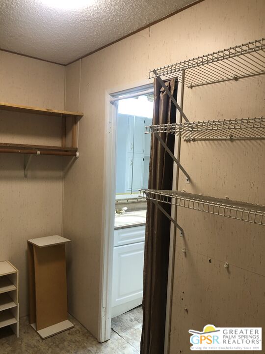 69525 Dillon Road, Unit 73 Desert Hot Springs, CA 92241 - Photo 8 of 48 a view of walk in closet