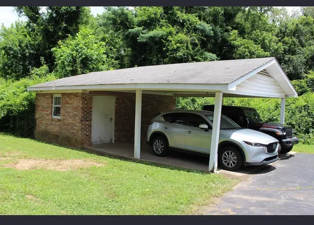 a view of a car in front of house