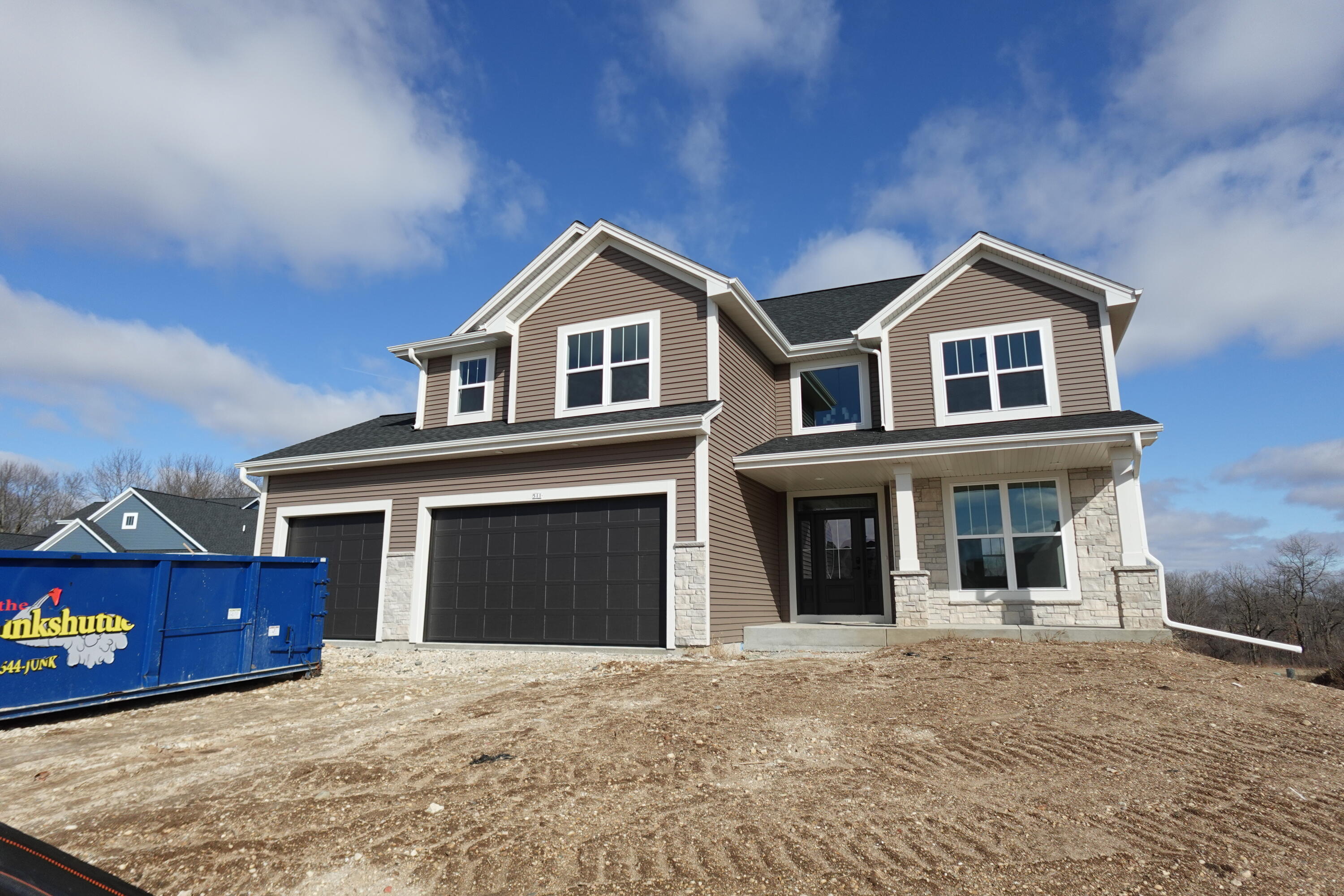 511 Woodside Court West Bend, WI 53095 - Photo 1 of 49 Front Elevation
