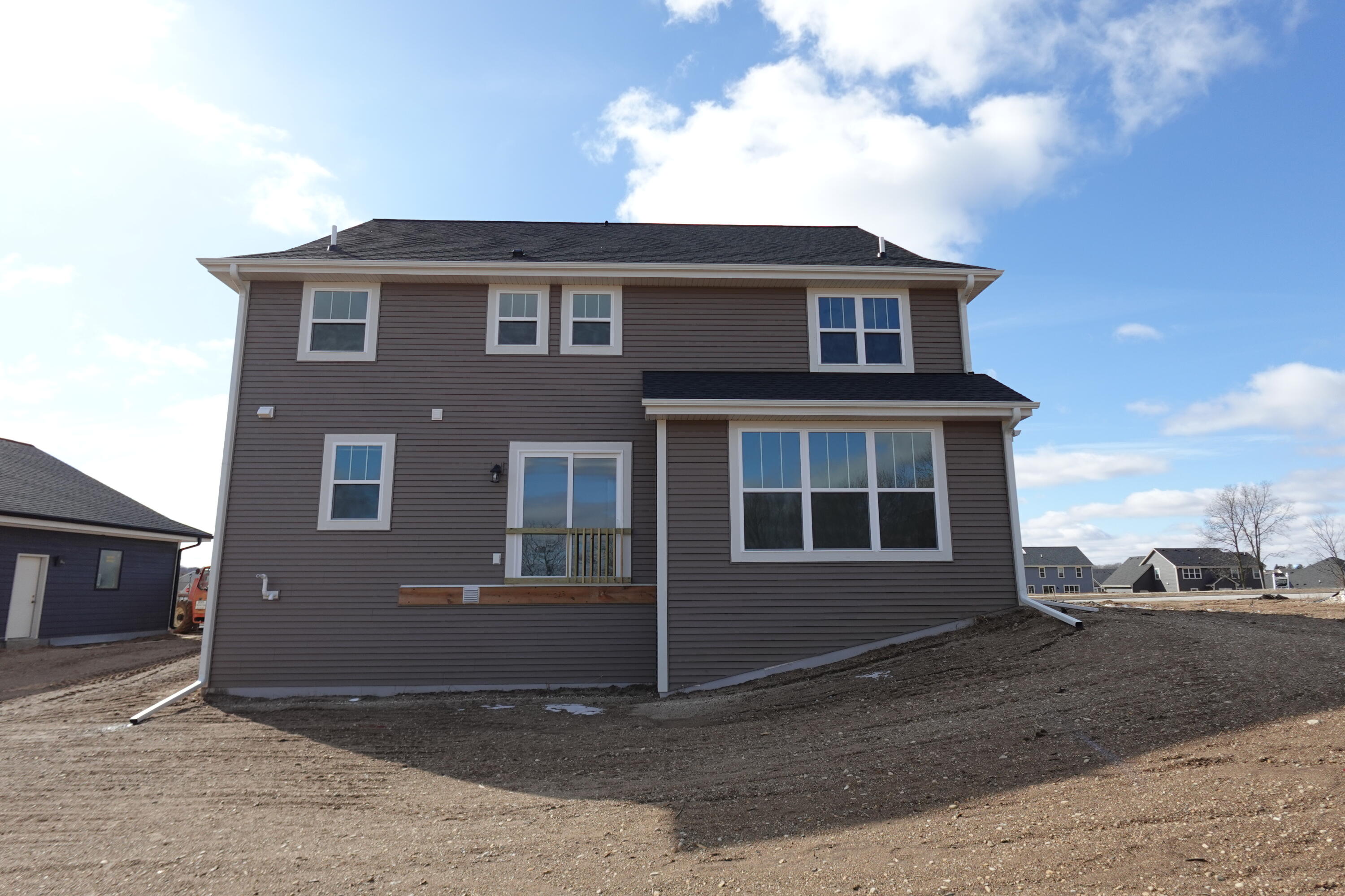 511 Woodside Court West Bend, WI 53095 - Photo 3 of 49 Rear Elevation
