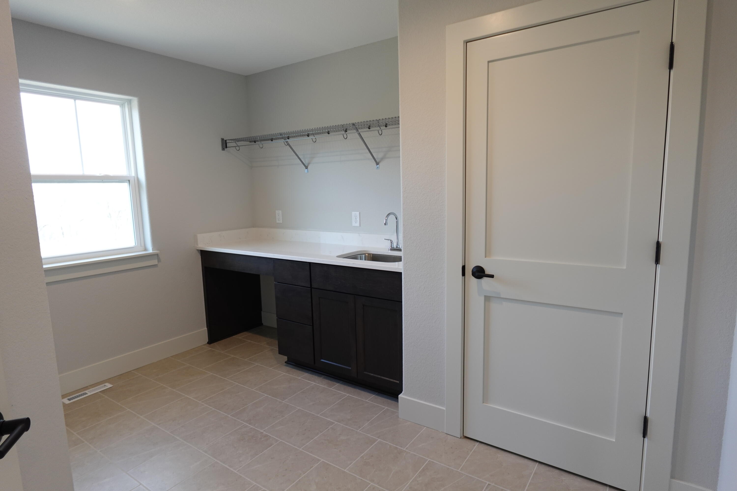 511 Woodside Court West Bend, WI 53095 - Photo 45 of 49 Laundry Room/Closet