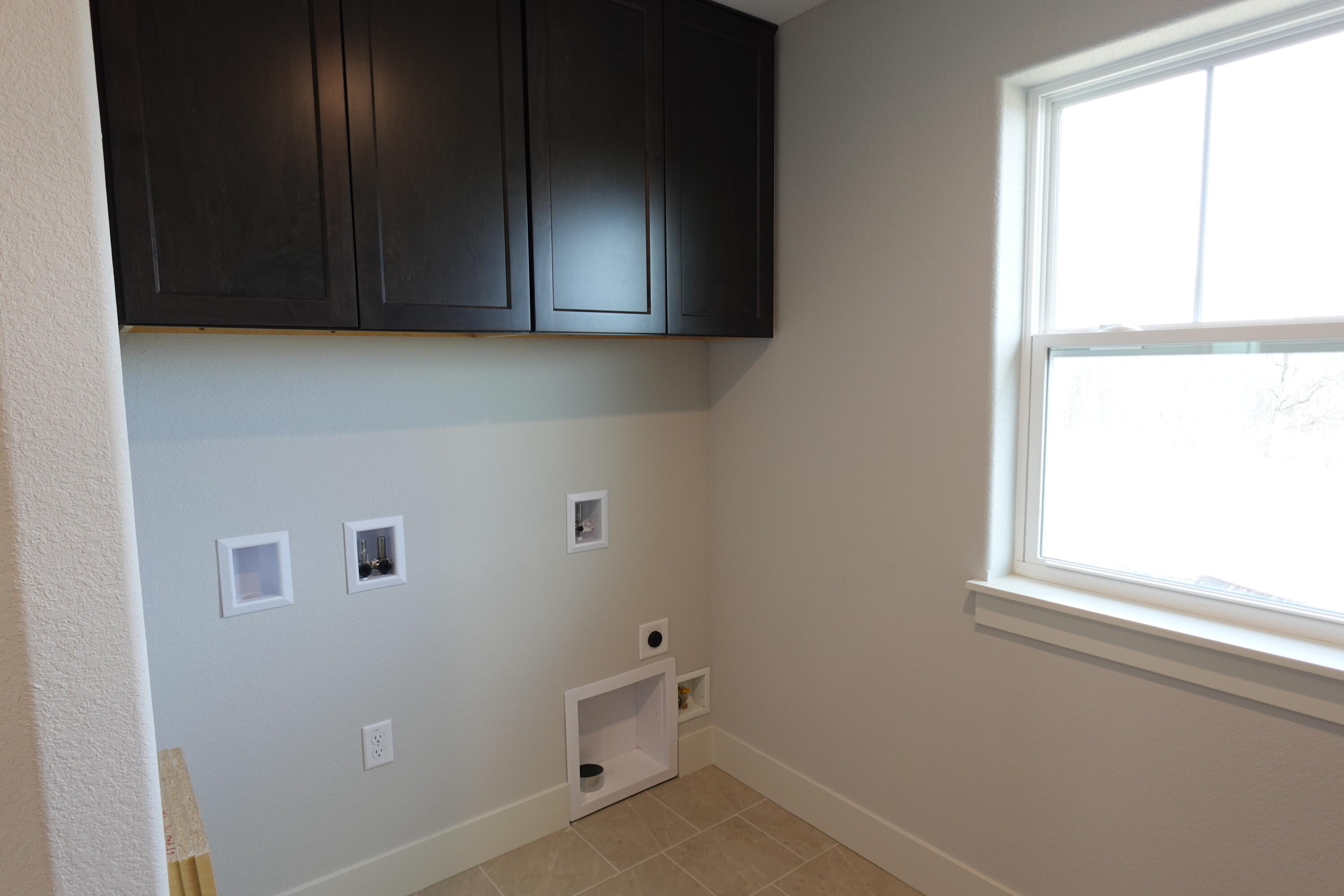 511 Woodside Court West Bend, WI 53095 - Photo 47 of 49 Laundry Room