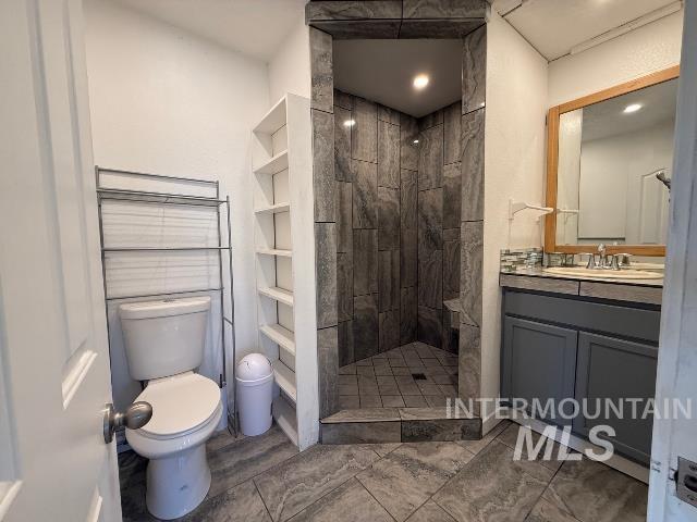 902 East Main Street Weiser, ID 83672 - Photo 28 of 45 Bathroom with vanity and a shower stall