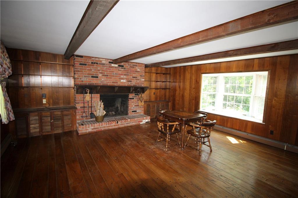 217 Navajo Road Pittsburgh, PA 15241 - Photo 5 of 25 The family room also has a beamed ceiling, hardwood flooring and a bay window overlooking the back yard.
